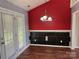 Cozy dining area with wood flooring, modern light fixture and walkout glass door at 823 Prestwick Dr, Rock Hill, SC 29730