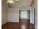Bright living room featuring hardwood floors, vaulted ceilings and a glass door for tons of natural light at 823 Prestwick Dr, Rock Hill, SC 29730