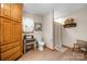 Bright bathroom featuring wood look floors, linen storage, and a shower with a curtain at 920 Hunting Ave, Lincolnton, NC 28092