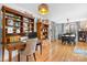 Open-concept living space featuring a dining room with a wooden table set, blending style and functionality at 920 Hunting Ave, Lincolnton, NC 28092