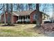 View of a beautiful brick and siding home with a covered front porch at 920 Hunting Ave, Lincolnton, NC 28092