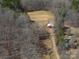 Aerial view of barn, pasture and wooded land at 939 Dameron Rd, Bessemer City, NC 28016