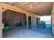 Barn interior view with tractor, lawn mower, and storage at 939 Dameron Rd, Bessemer City, NC 28016