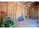 Well-lit barn interior showcasing storage space, equipment, and natural light at 939 Dameron Rd, Bessemer City, NC 28016