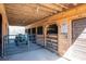 Spacious barn interior with multiple stalls, tractor, and wooden construction at 939 Dameron Rd, Bessemer City, NC 28016