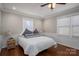 Comfortable bedroom with hardwood floors, natural light, and neutral decor at 939 Dameron Rd, Bessemer City, NC 28016