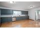 Well-lit kitchen featuring stainless steel appliances, classic subway tile, and neutral finishes at 939 Dameron Rd, Bessemer City, NC 28016