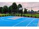 Community basketball court next to a playground and picnic area at 9760 Springholm Dr, Charlotte, NC 28278