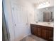 Bathroom featuring double sink vanity and a large mirror at 9760 Springholm Dr, Charlotte, NC 28278