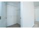 Walk-in closet features wire shelving for storage and organization at 9760 Springholm Dr, Charlotte, NC 28278