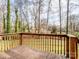View from wood deck showing spacious backyard and bare trees at 1005 Maywood St, Kannapolis, NC 28081