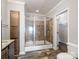 Modern bathroom with a large, glass-enclosed shower and stylish finishes at 1005 Maywood St, Kannapolis, NC 28081