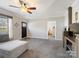 Bright living room showcasing neutral colors, a fan, and an open floor plan at 1005 Maywood St, Kannapolis, NC 28081