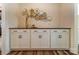 Stylish buffet area with decorative plates and ample storage, perfect for entertaining at 108 Ellsworth Rd # 40, Mooresville, NC 28115