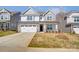 Charming two-story home with stone accents and well-manicured lawn, creating a welcoming curb appeal at 108 Ellsworth Rd # 40, Mooresville, NC 28115