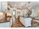 Modern kitchen with a large island, stainless steel appliances, and pendant lighting at 108 Ellsworth Rd # 40, Mooresville, NC 28115