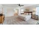 Comfortable main bedroom with neutral tones, carpet, and a view to an open door, showcasing a functional layout at 108 Ellsworth Rd # 40, Mooresville, NC 28115