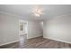 Inviting living room featuring stylish flooring and modern ceiling fan at 1104 Laurel St, Salisbury, NC 28144