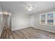 Open living room with a ceiling fan, and new flooring perfect for entertaining at 1104 Laurel St, Salisbury, NC 28144