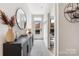 Inviting entryway featuring modern decor, a stylish console table, and natural light at 1108 Wesley Terrace Ave, Charlotte, NC 28208