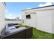Rooftop deck featuring artificial turf, outdoor furniture, and a wall-mounted television at 1108 Wesley Terrace Ave, Charlotte, NC 28208