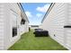 Rooftop terrace with artificial turf, outdoor seating, and views of the surrounding neighborhood at 1108 Wesley Terrace Ave, Charlotte, NC 28208