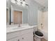 Bright bathroom featuring a shower and tub combination and large mirror at 1245 Periwinkle Dr, Waxhaw, NC 28173