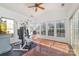 Spacious exercise room with large windows, hardwood floors, and fitness equipment, ideal for workouts at 1245 Periwinkle Dr, Waxhaw, NC 28173