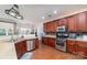 Kitchen with wood cabinets, stainless steel appliances, and a tile backsplash at 1245 Periwinkle Dr, Waxhaw, NC 28173