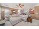 Spacious living room with a large sectional sofa and a view of the kitchen at 1245 Periwinkle Dr, Waxhaw, NC 28173