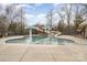 Community pool area featuring a mushroom water feature and water slide under a bright sky at 1245 Periwinkle Dr, Waxhaw, NC 28173
