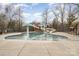 Community pool featuring a mushroom fountain, water slides, and lounge seating at 1245 Periwinkle Dr, Waxhaw, NC 28173