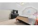 Attic bedroom with a bed, a large dresser, and a window at 1511 35Th Ne Ave, Hickory, NC 28601