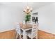 Dining room features hardwood floors and a chandelier at 1511 35Th Ne Ave, Hickory, NC 28601