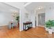 Inviting foyer with hardwood floors, a console table, and views into the dining room at 1511 35Th Ne Ave, Hickory, NC 28601