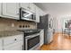 Well-equipped kitchen with stainless steel appliances and granite countertops at 1511 35Th Ne Ave, Hickory, NC 28601