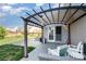 Relaxing covered patio area with outdoor seating and a view of the backyard at 1535 Scarbrough Sw Cir, Concord, NC 28025