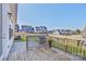 Back deck overlooking the backyard, complete with a grill and view of a friendly neighborhood at 19007 Dry Narrows Way, Charlotte, NC 28278