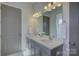 Stylish bathroom featuring a double vanity with modern lighting and ample counter space at 19007 Dry Narrows Way, Charlotte, NC 28278