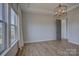 Bright bedroom featuring a large window and ample space, providing a relaxing retreat at 19007 Dry Narrows Way, Charlotte, NC 28278
