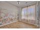 Bright bedroom with artistic wallpaper at 19007 Dry Narrows Way, Charlotte, NC 28278