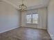 Serene bedroom with natural light, tray ceiling, and neutral décor, creating a calming atmosphere at 19007 Dry Narrows Way, Charlotte, NC 28278