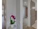 Inviting entryway featuring neutral tones, wood-look floors, and decorative wainscoting for a welcoming first impression at 19007 Dry Narrows Way, Charlotte, NC 28278