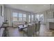 Spacious living room with modern decor and expansive windows providing scenic views at 19007 Dry Narrows Way, Charlotte, NC 28278