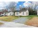 Charming exterior elevation of this cozy single-story home with natural light at 234 Marshall St, Rock Hill, SC 29730