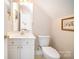 Bathroom with a single vanity, mirror, and toilet at 286 Canvasback Rd, Mooresville, NC 28117