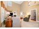 Inviting living room featuring a fireplace, tall ceilings, and comfortable seating at 286 Canvasback Rd, Mooresville, NC 28117