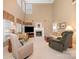 Spacious living room featuring a fireplace, tall ceilings, and comfortable seating at 286 Canvasback Rd, Mooresville, NC 28117