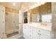 The main bathroom features a double vanity, white cabinets, and a glass-enclosed shower at 286 Canvasback Rd, Mooresville, NC 28117
