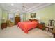 Bright main bedroom with tray ceilings, ceiling fan, and ample natural light at 286 Canvasback Rd, Mooresville, NC 28117